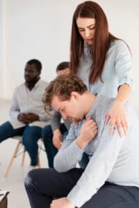 beautiful-woman-trying-console-patient-771608