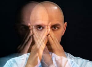 portrait-man-suffering-from-schizophrenia-536533